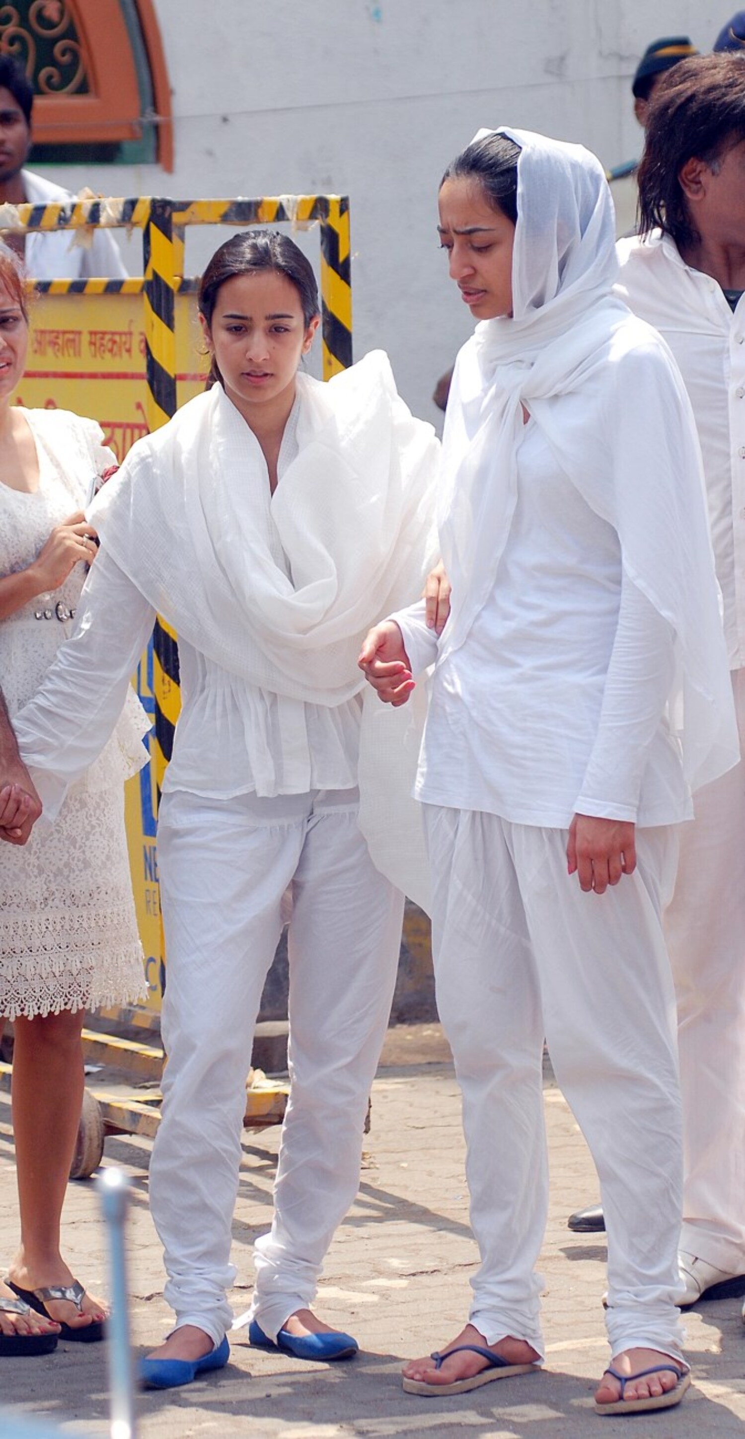 Sisters of Jiah Khan Kavita and Karisma at the burial of their actress