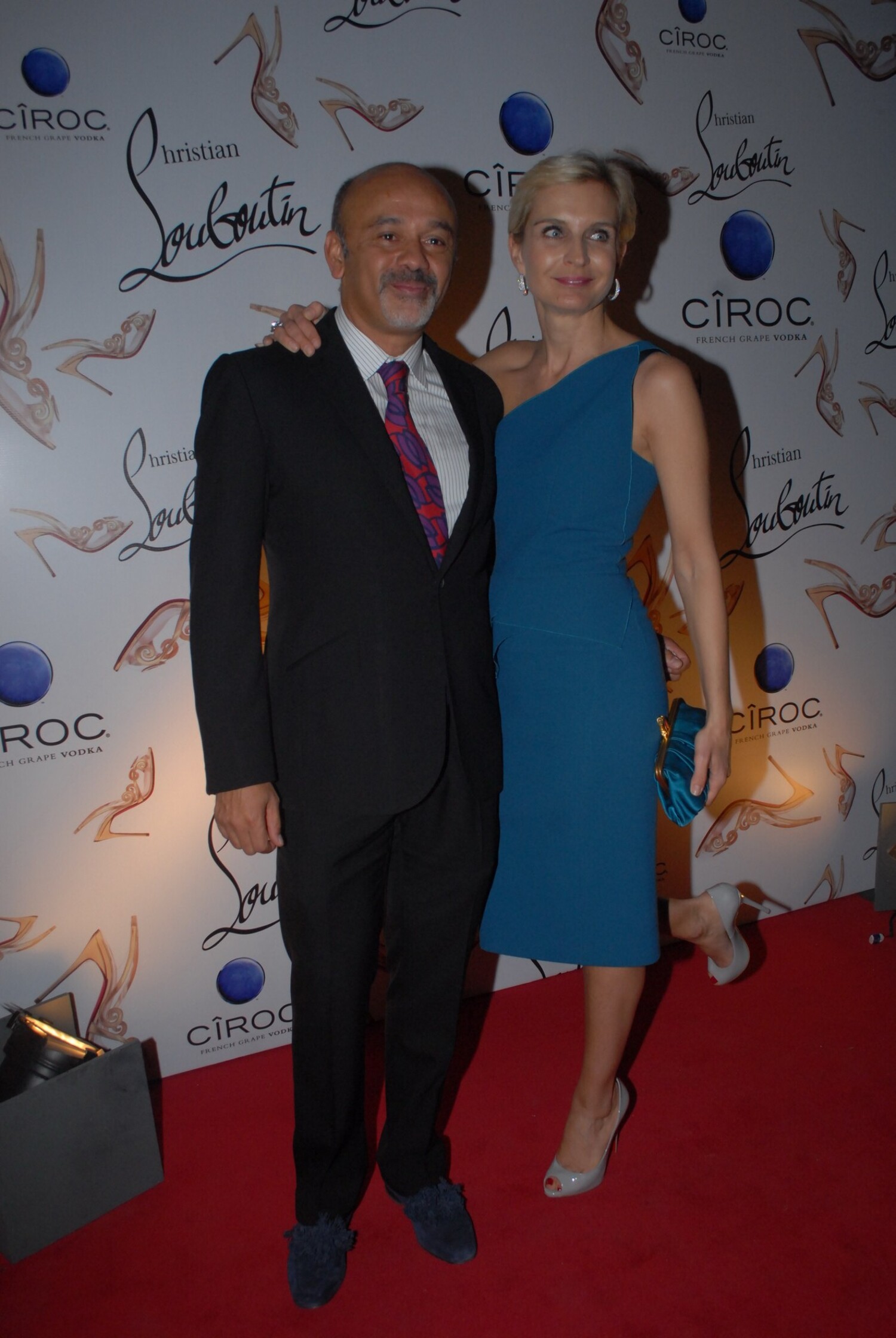 Christian Louboutin posing with his wife at the 2nd flagship store launch of designer Christian Louboutin in Mumbai : rediff photos - photo from album amitabh and abhay deol