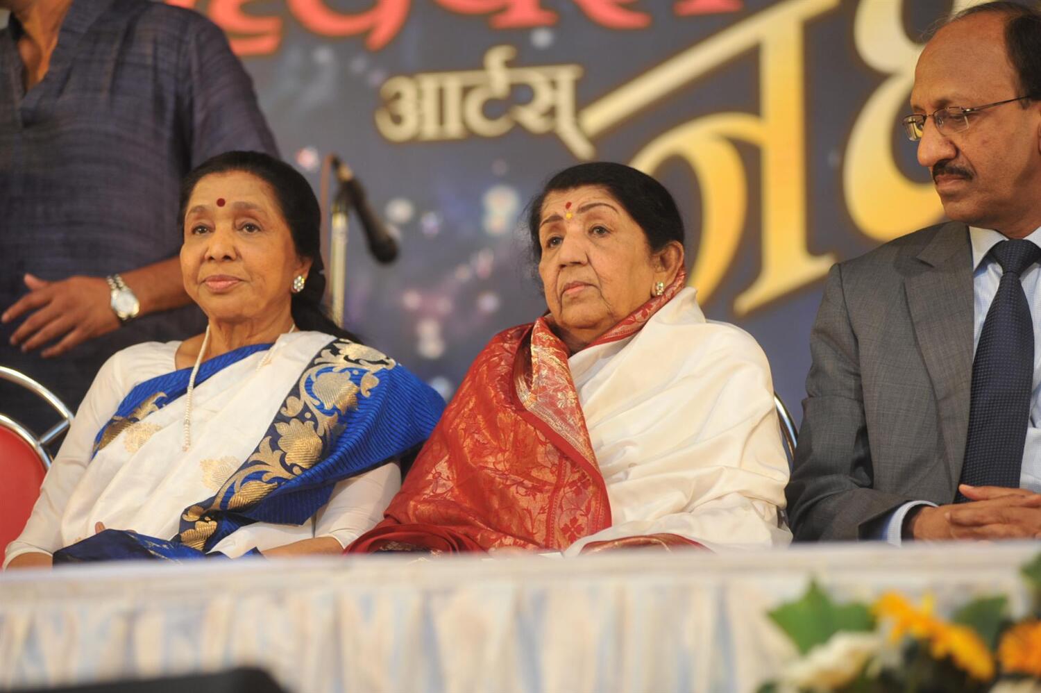 Asha Bhosle with sister Lata Mangeshkar at Pandit Hridaynath Mangeshkar ...